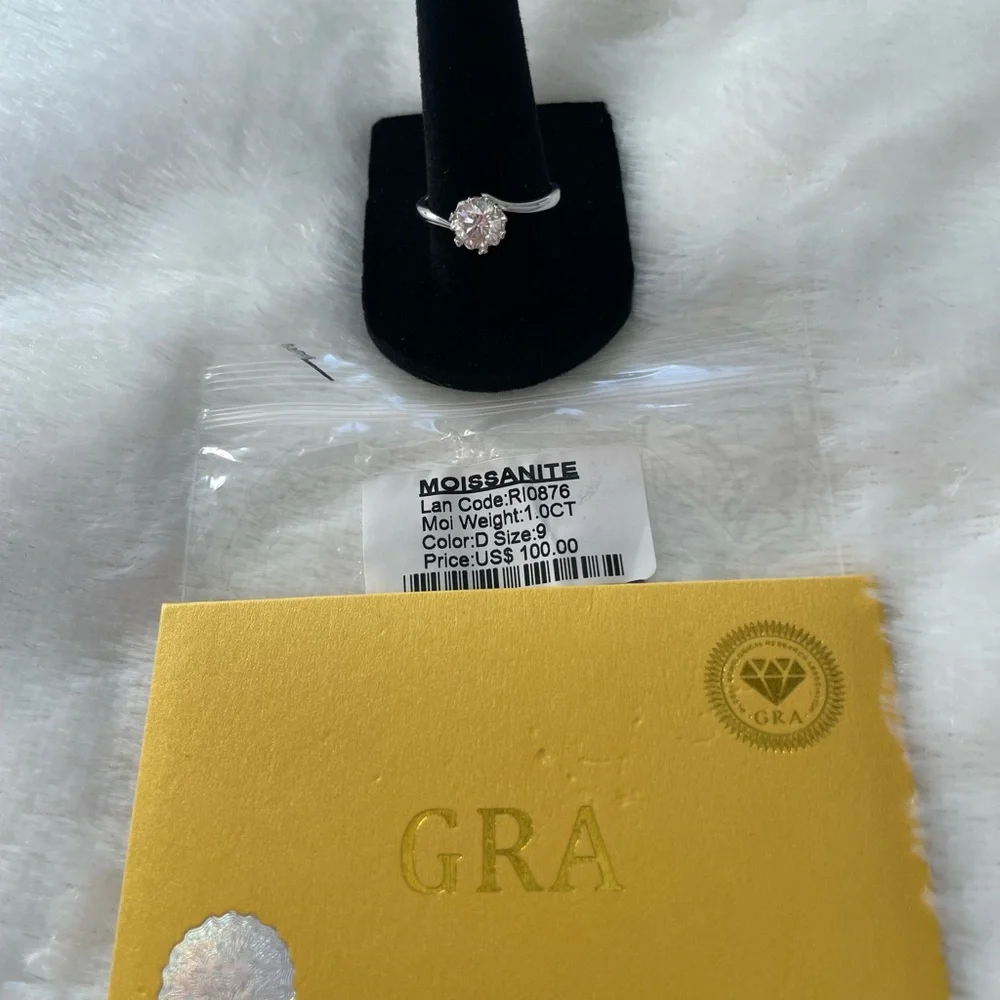 Women’s size 9 solitaire Moissanite ring